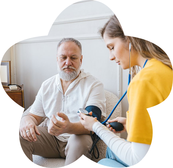 Nurse checking a patient's blood pressure